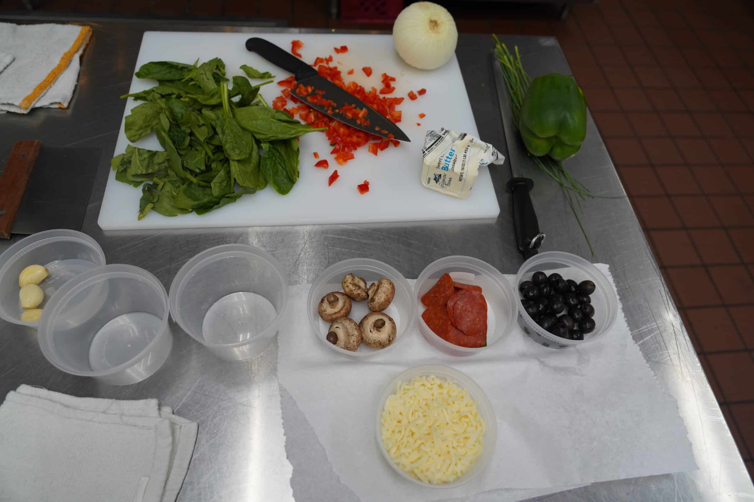 Ingredients and vegetables prepared for a culinary training session at Kitchens for Good
